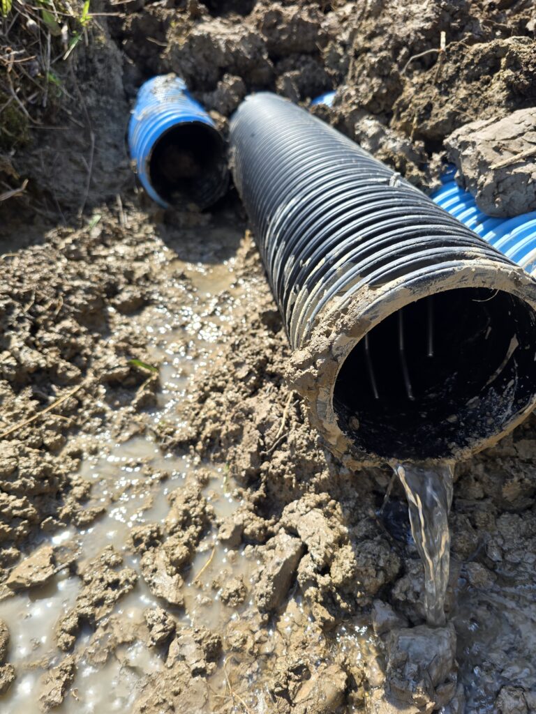 Drainage support excavation for trenching and water management improvements